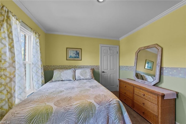 carpeted bedroom with ornamental molding