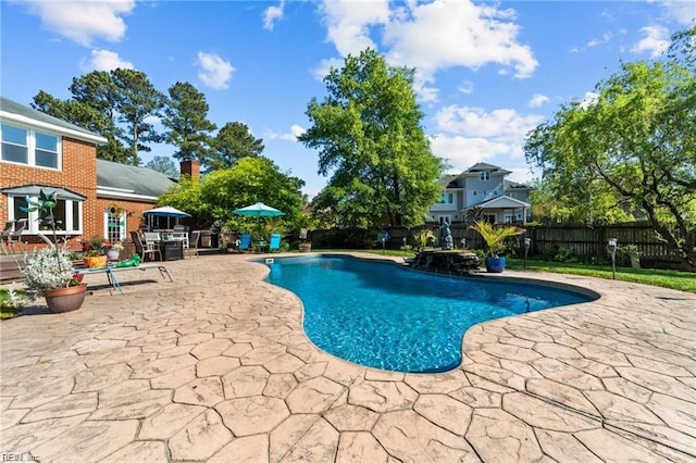 view of pool featuring a patio area