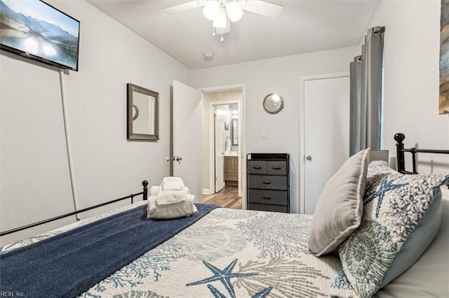 bedroom with ceiling fan and light wood-type flooring