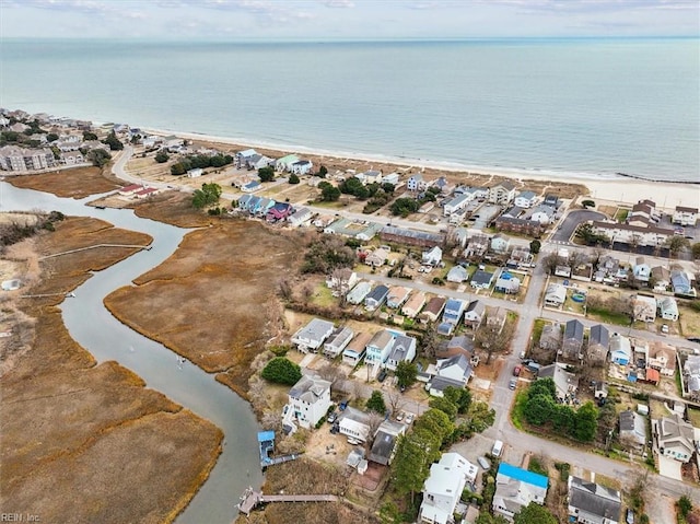 aerial view with a view of the beach and a water view