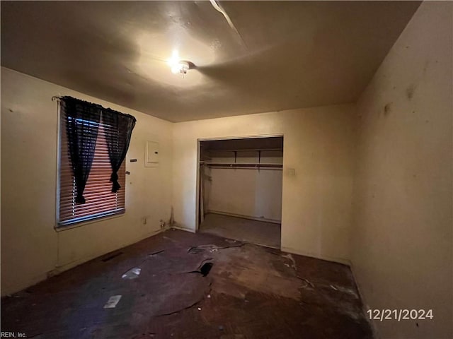 unfurnished bedroom featuring a closet