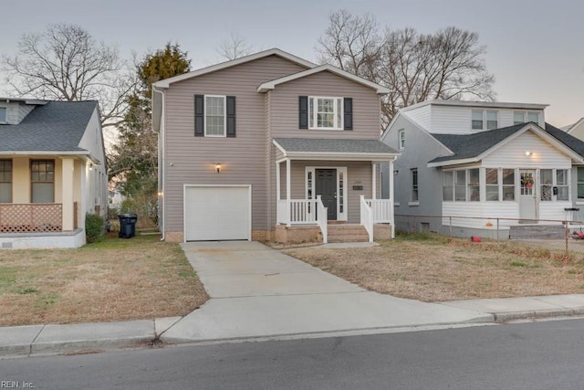 front of property with a garage