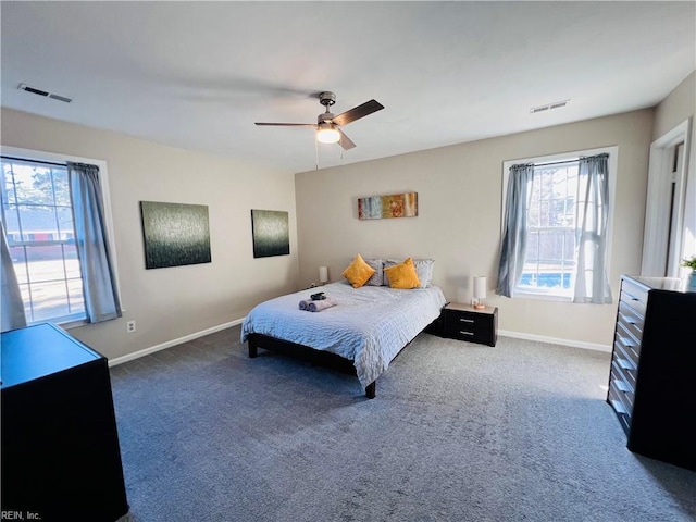 carpeted bedroom featuring ceiling fan