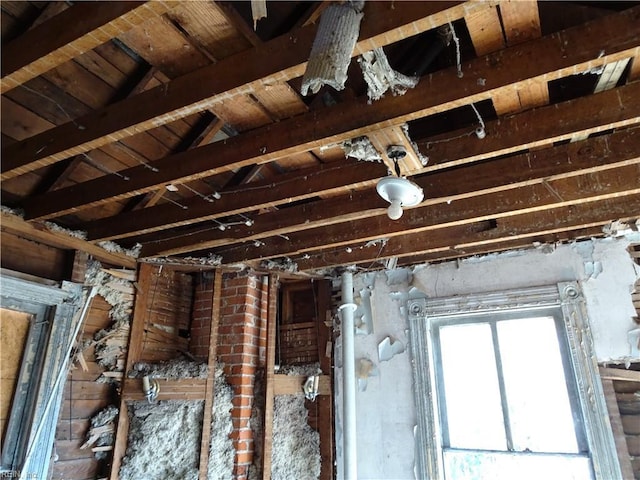 miscellaneous room featuring lofted ceiling with beams