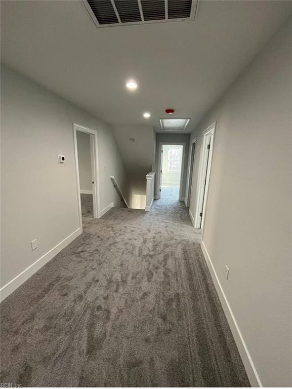 corridor featuring carpet