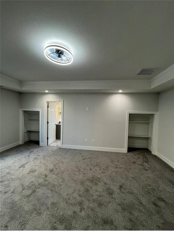 basement featuring carpet floors and ornamental molding