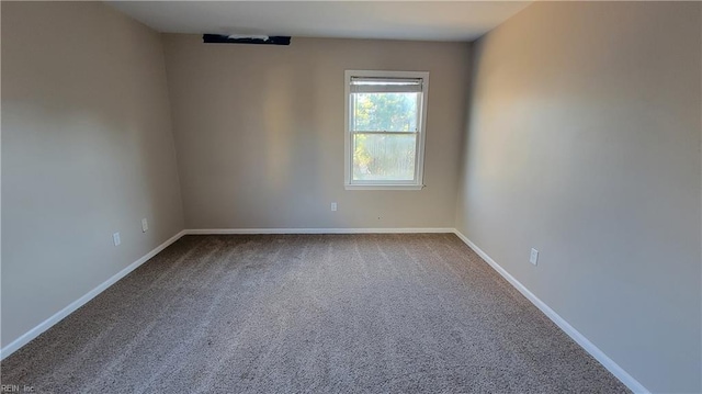 unfurnished room featuring carpet floors