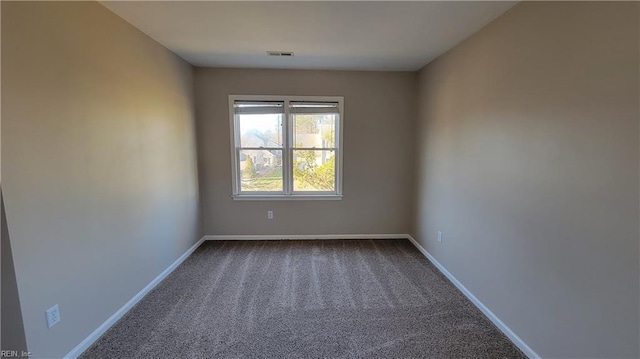 empty room featuring carpet