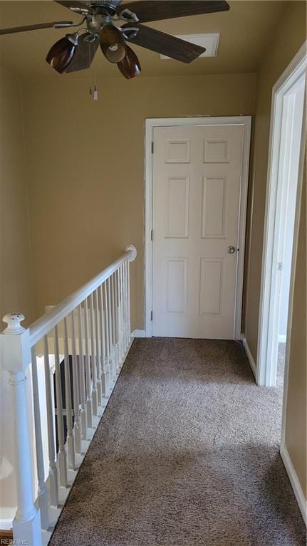 corridor featuring carpet floors