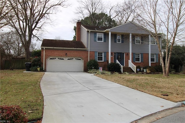 view of front of home featuring a garage and a front lawn