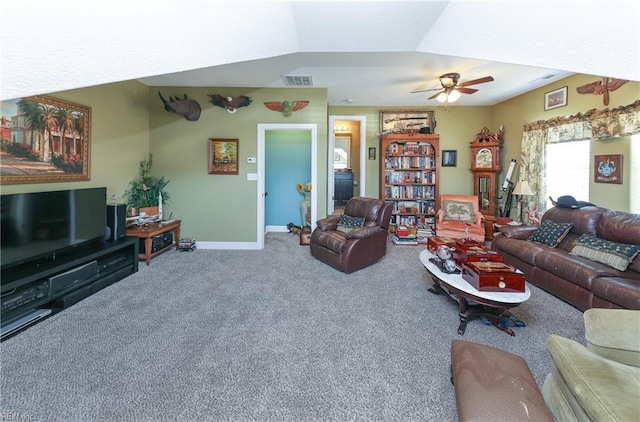 living room with carpet flooring, ceiling fan, and lofted ceiling