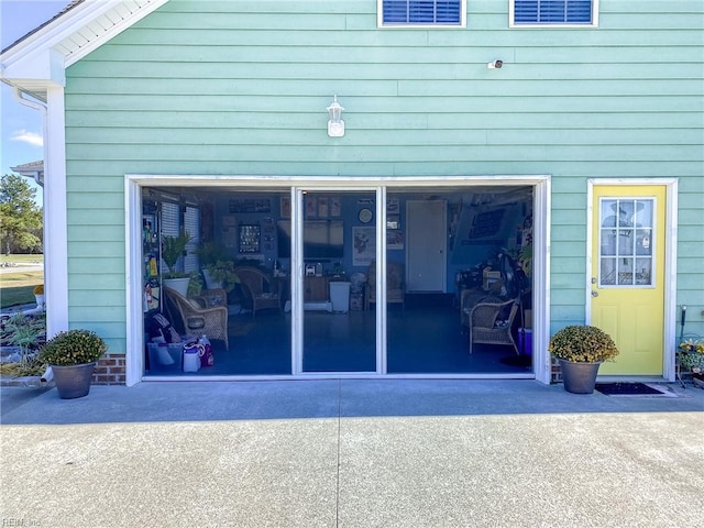 view of side of home featuring a garage