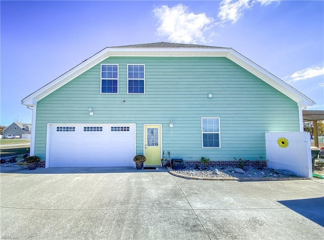 view of property exterior with a garage