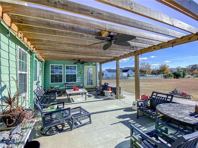 view of patio / terrace featuring outdoor dining area and a ceiling fan