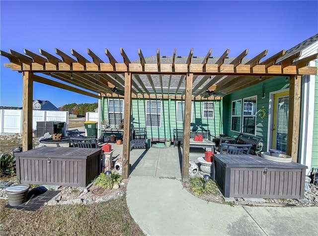 view of patio / terrace with a pergola and ceiling fan