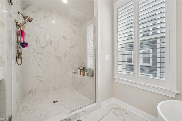 bathroom with separate shower and tub