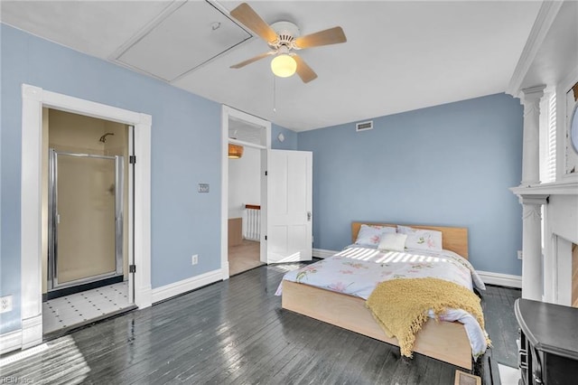 bedroom featuring ceiling fan, dark hardwood / wood-style flooring, and ensuite bathroom