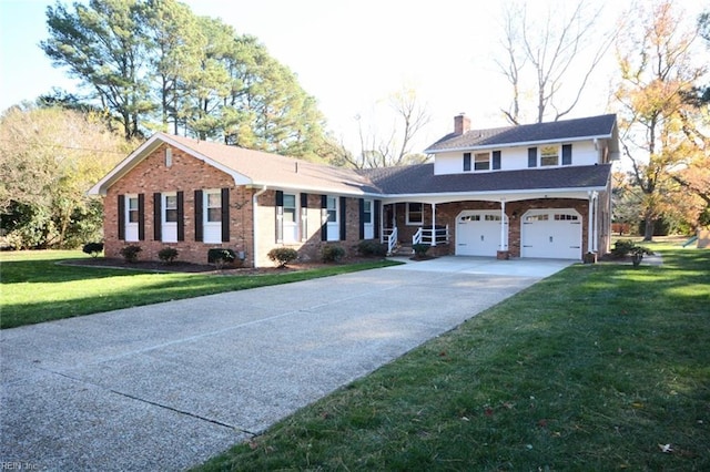 view of front of house featuring a garage and a front lawn