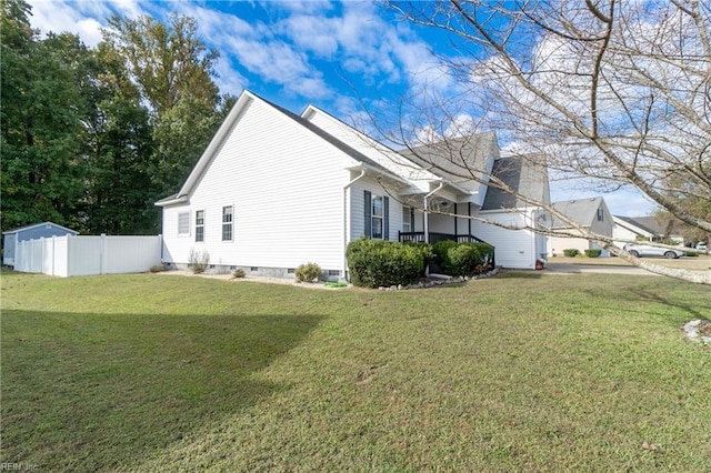 view of property exterior with a lawn