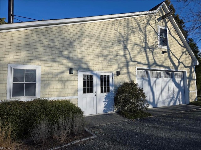 exterior space with a garage