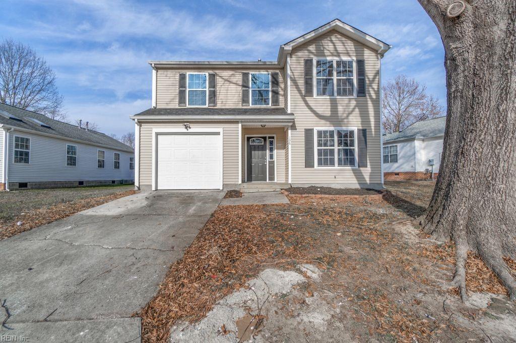 view of front property with a garage