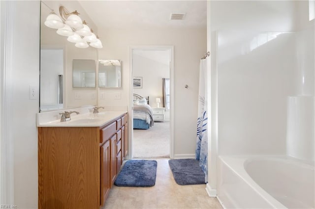 bathroom with vanity and shower / bathtub combination with curtain