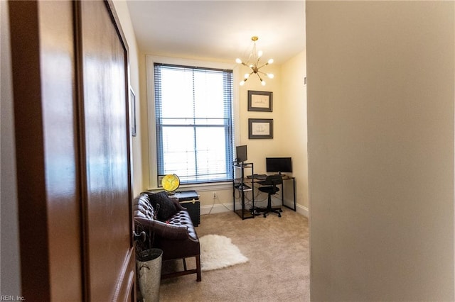 carpeted office space with a wealth of natural light and an inviting chandelier