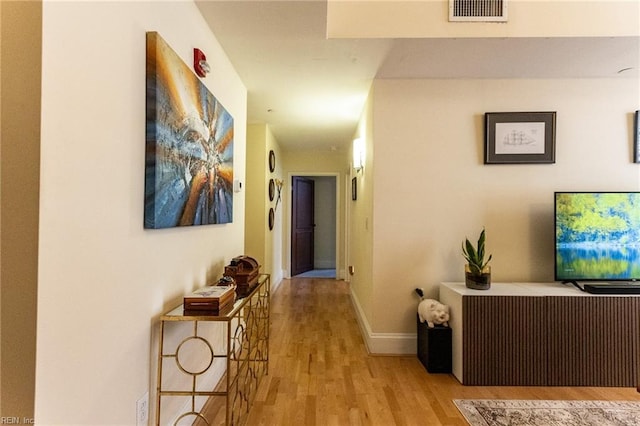 hallway featuring light hardwood / wood-style flooring