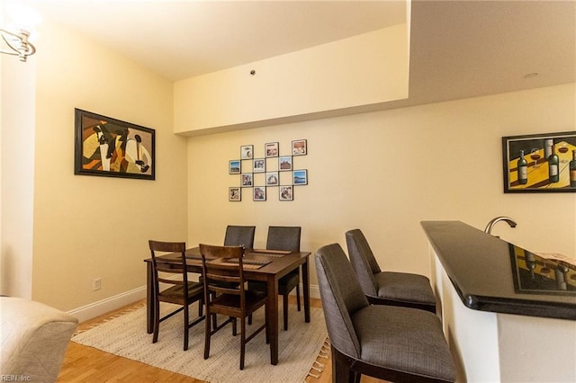 dining room with hardwood / wood-style floors