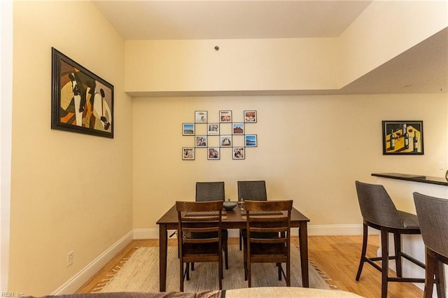 dining area featuring light hardwood / wood-style floors