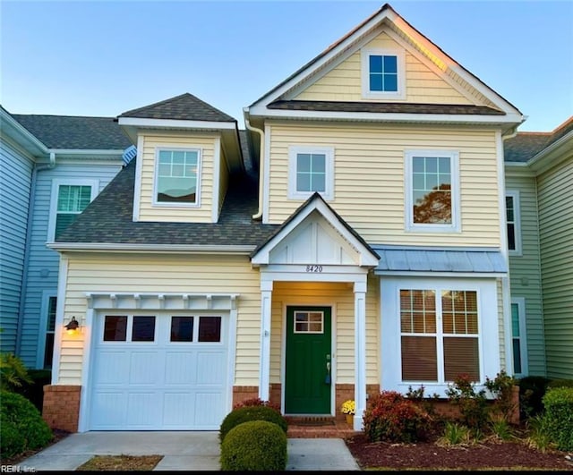 view of front of home with a garage