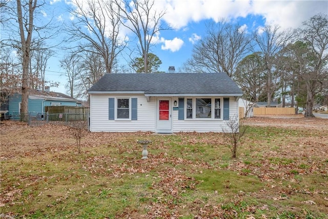 view of front of property with a front lawn