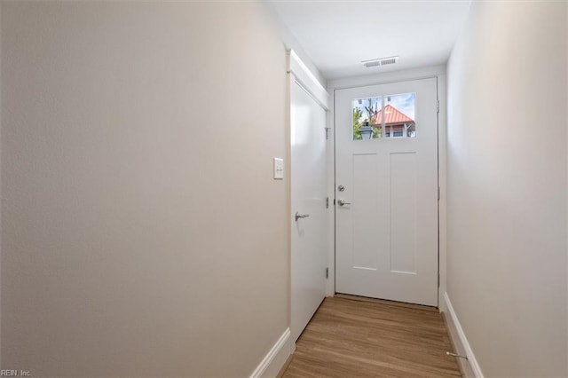 doorway featuring light hardwood / wood-style floors