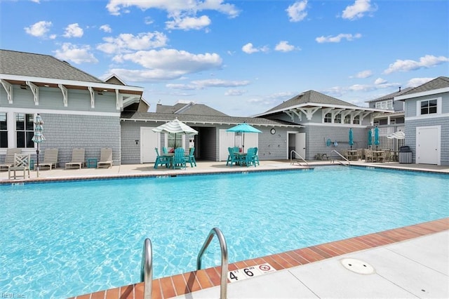 view of pool with a patio area