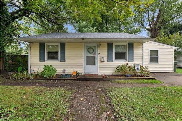 view of front of home with a front yard