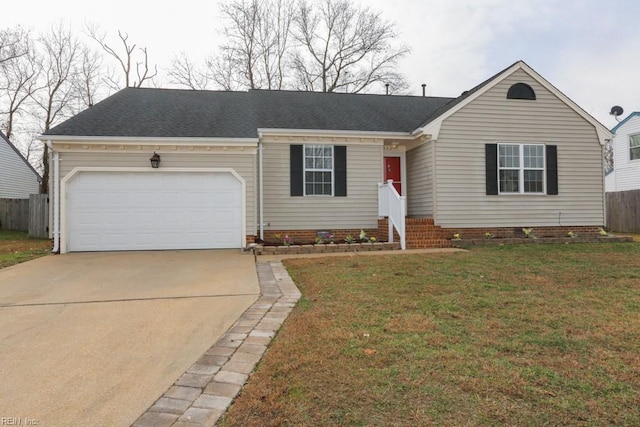 ranch-style house with a garage and a front lawn