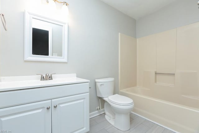 full bathroom featuring vanity, toilet, and tub / shower combination