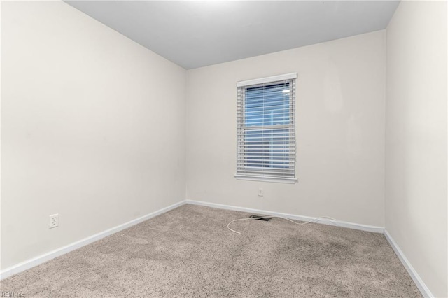 view of carpeted spare room