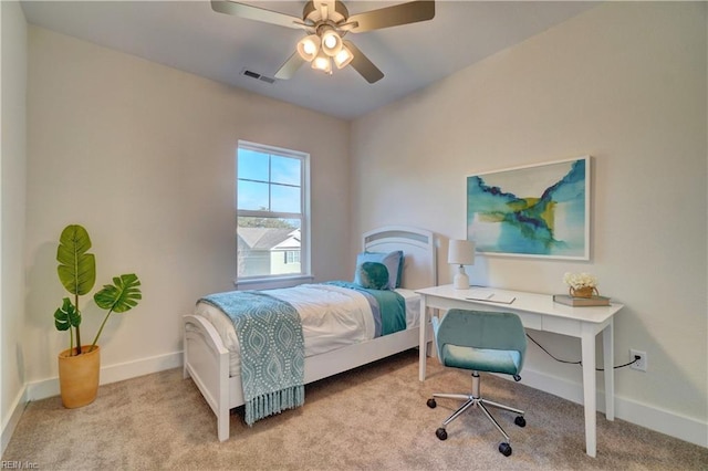 carpeted bedroom with ceiling fan