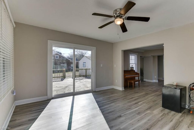 interior space featuring ceiling fan and hardwood / wood-style floors