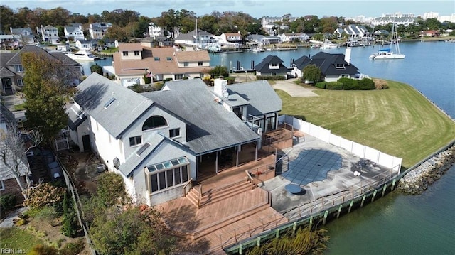 drone / aerial view with a water view