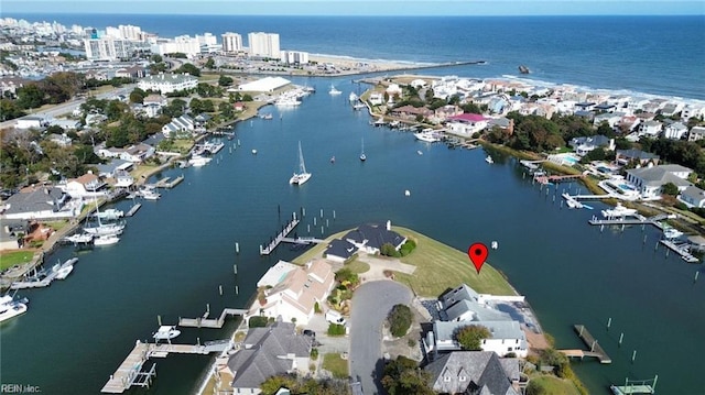 bird's eye view with a water view