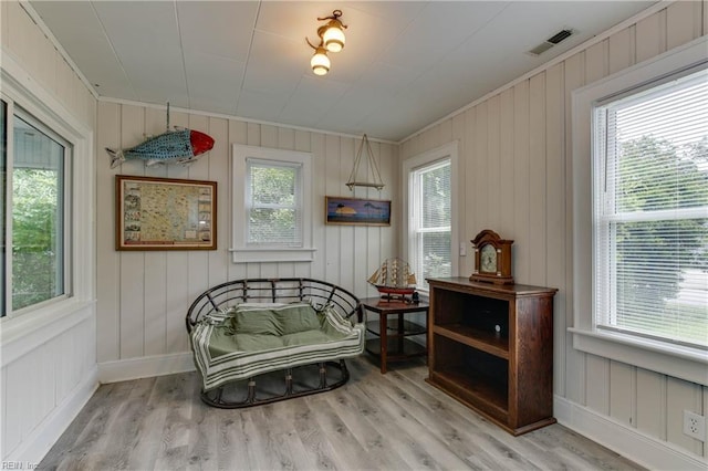 sitting room featuring plenty of natural light and light wood-type flooring