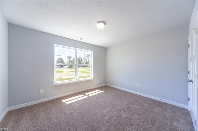 unfurnished room with carpet