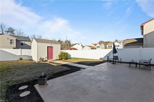 view of patio featuring a storage shed