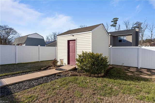 view of outdoor structure with a yard