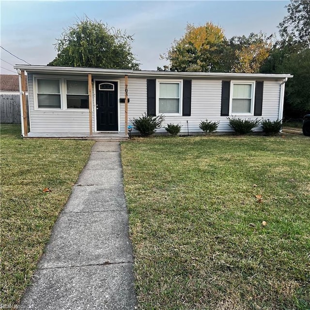 view of front of home with a front lawn