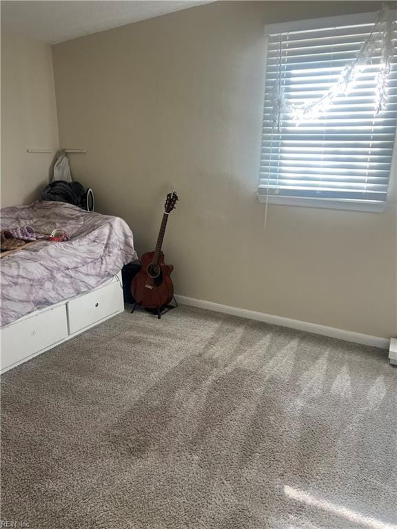 bedroom featuring carpet flooring