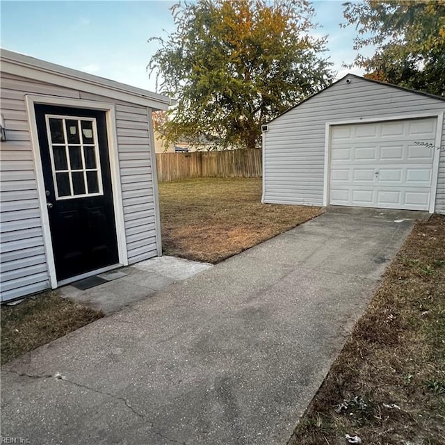 garage featuring a yard