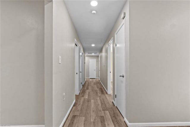 hall featuring light hardwood / wood-style flooring